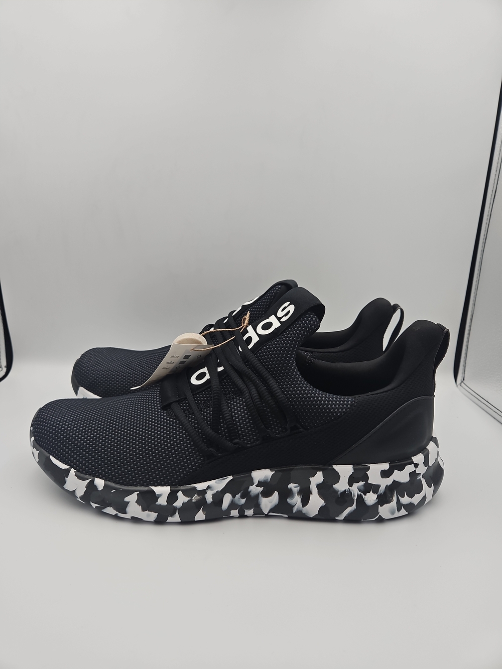 adidas Black Knit Sneakers with Black & White Camouflage Sole